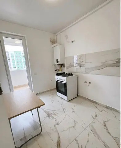 Vand garsoniera in bloc nou